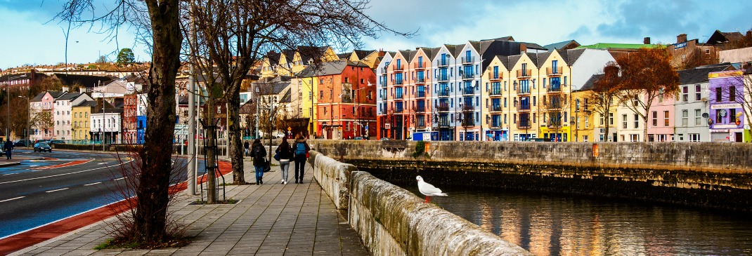 The shops, bars and restaurants on the bank of the River Lee in Cork’s city center.